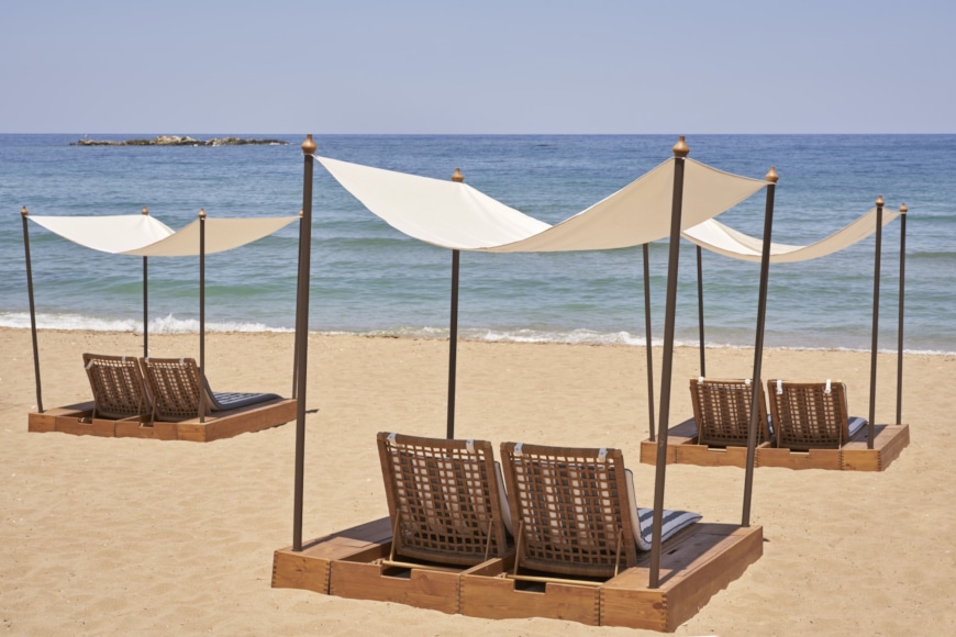 chairs and umbrellas on a beach