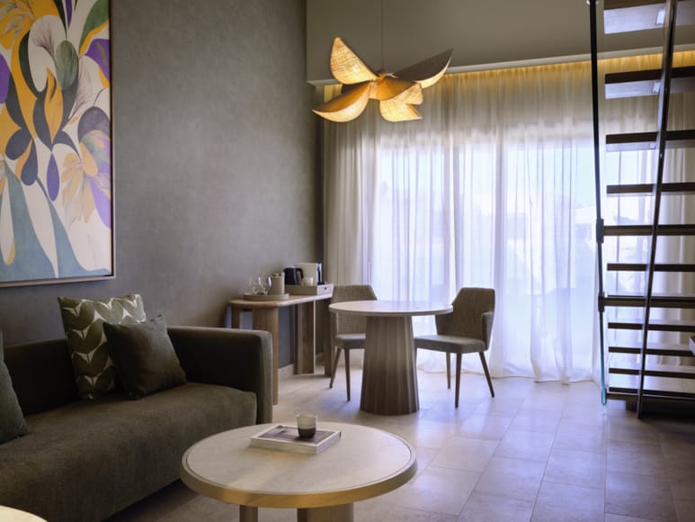 a living room with a couch and a table