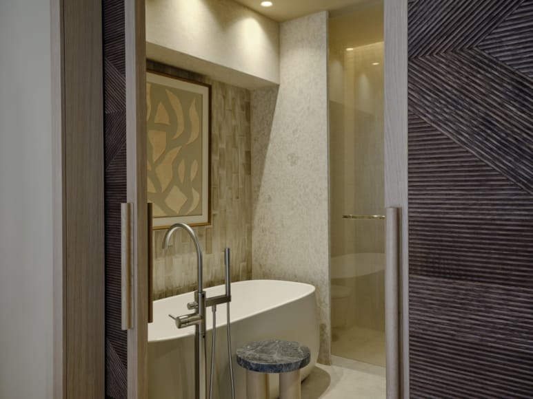 a bathroom with a sink and shower