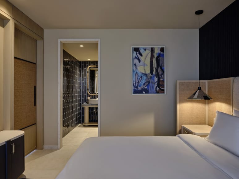 a bedroom with a large bed