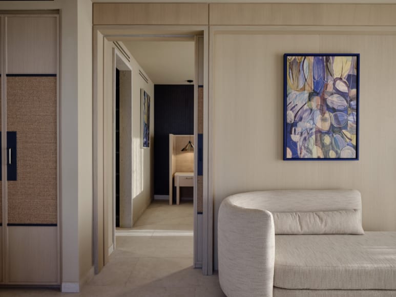 a room with a couch and a chair