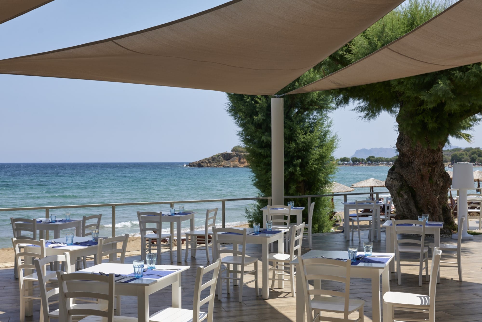 tables and chairs on a deck