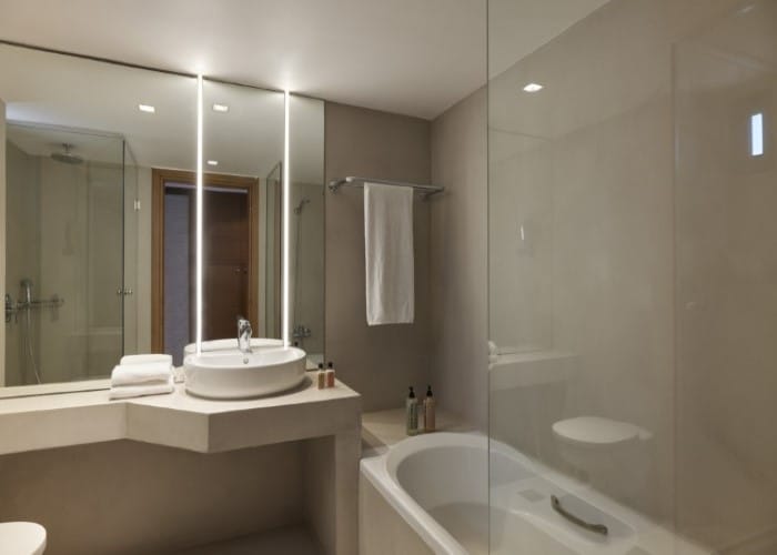 a bathroom with a glass shower
