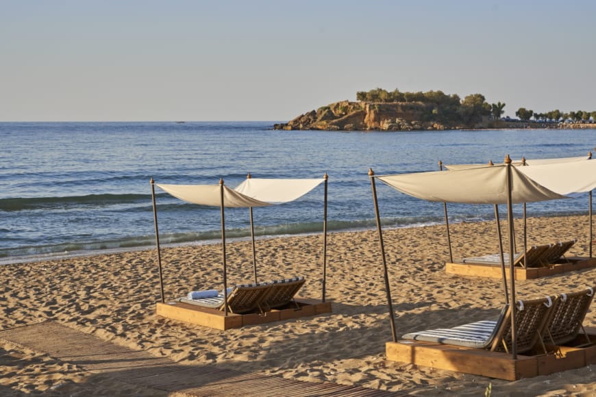 chairs and umbrellas on a beach