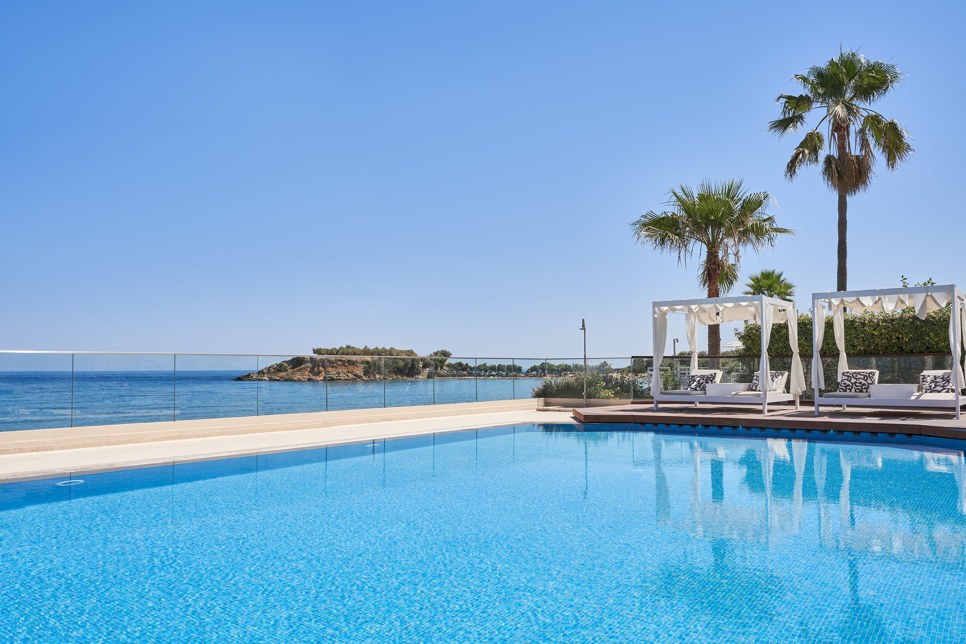 a pool next to a beach