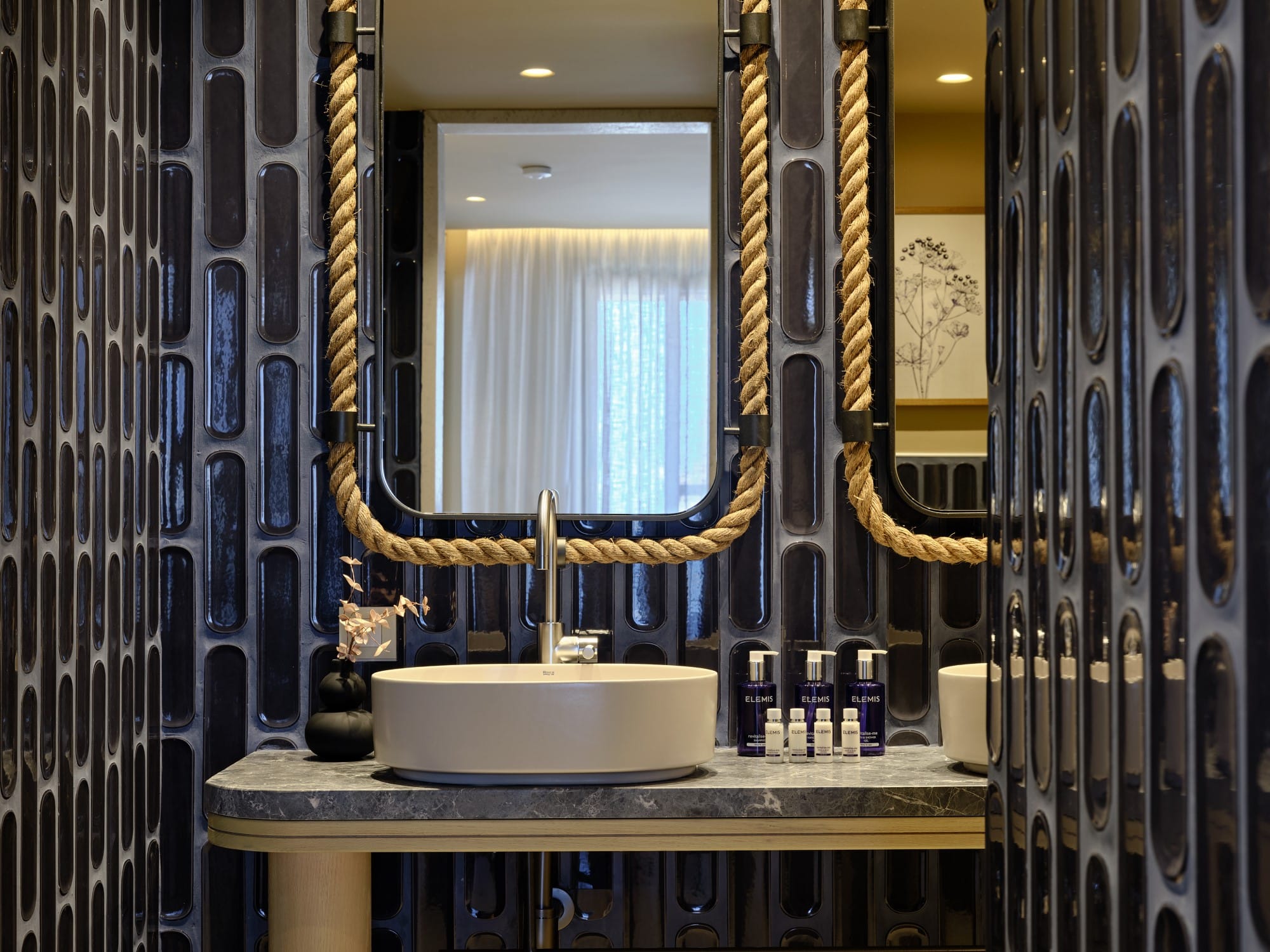a bathroom with a large mirror
