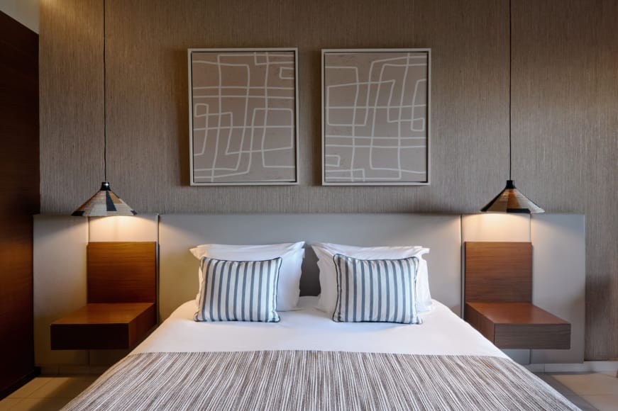 a bed with white pillows