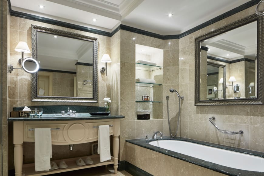 a bathroom with a large mirror