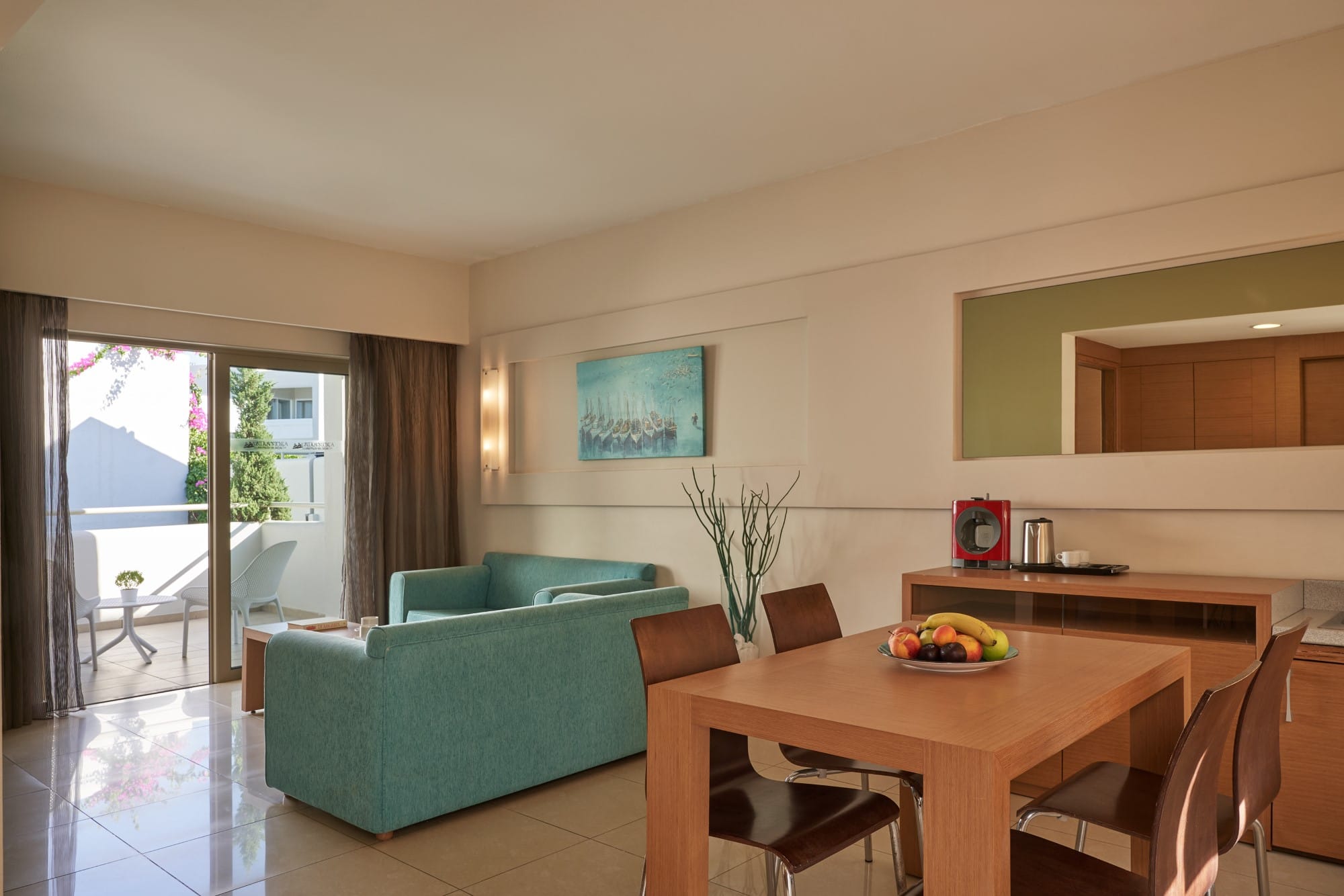 a living room with a green couch