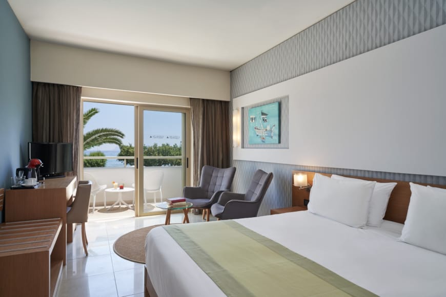 a hotel room with a large bed