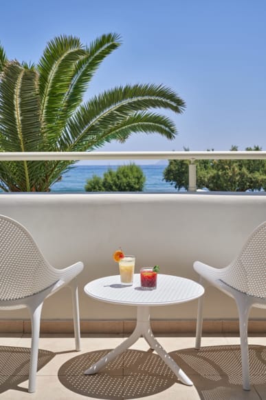 a table and chairs on a deck