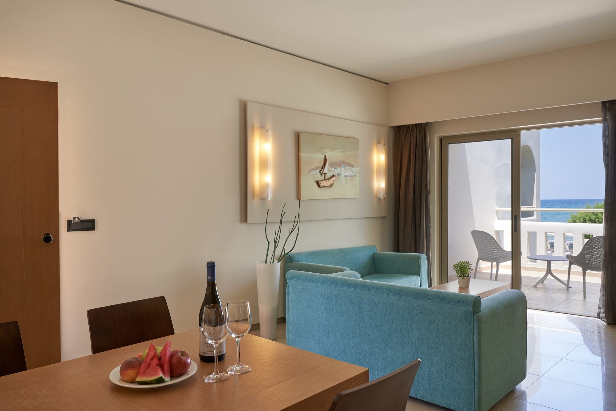 a dining room with a table and chairs