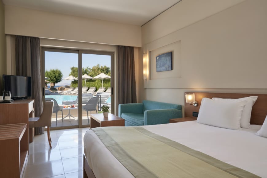 a hotel room with a pool