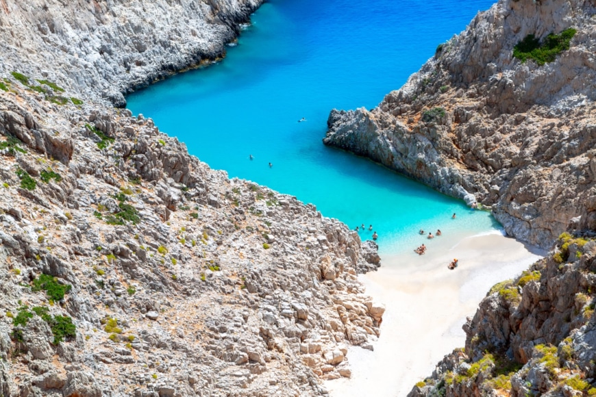 a beach with a body of water