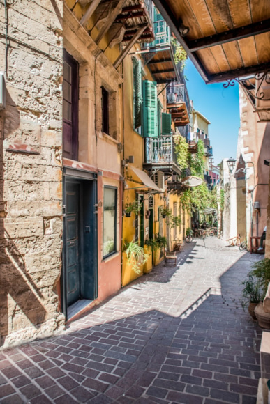 a narrow street with buildings on both sides