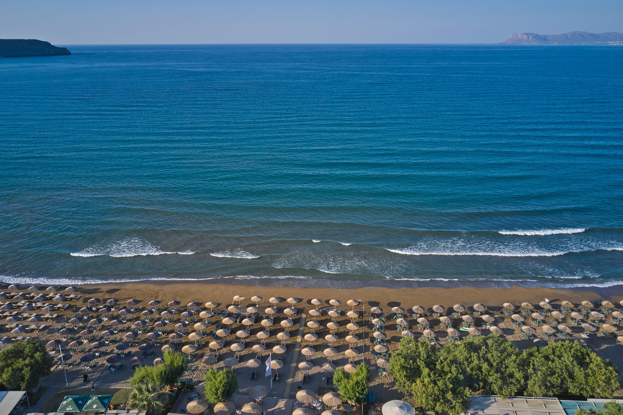a beach with waves crashing