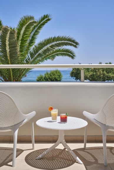a table and chairs on a deck
