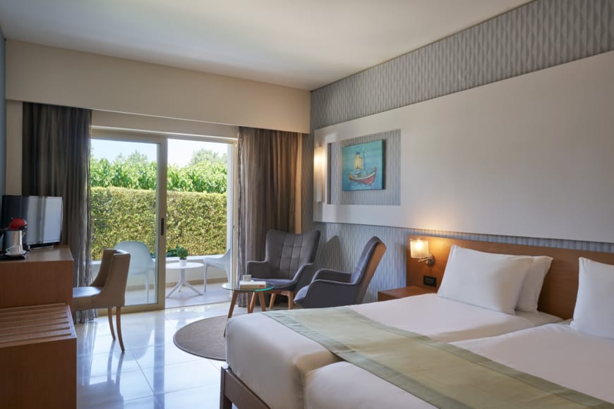 a hotel room with a large bed