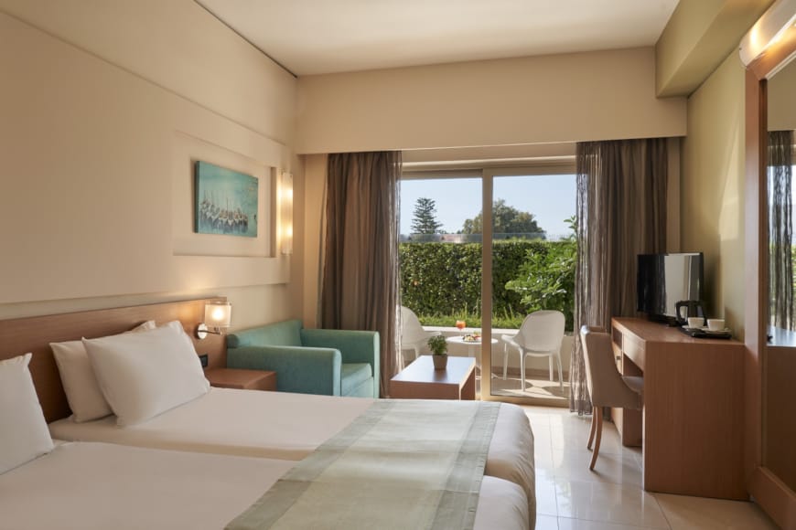 a hotel room with a large window