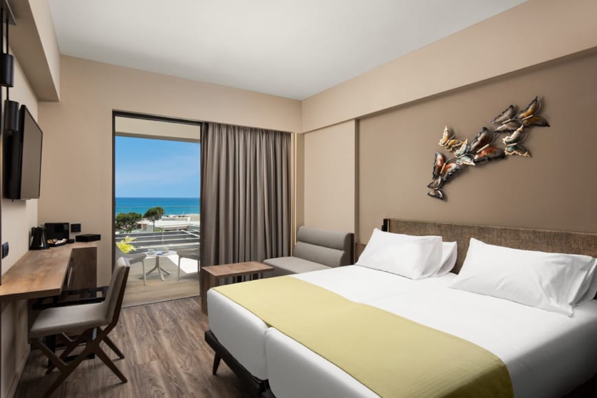 a hotel room with a large window