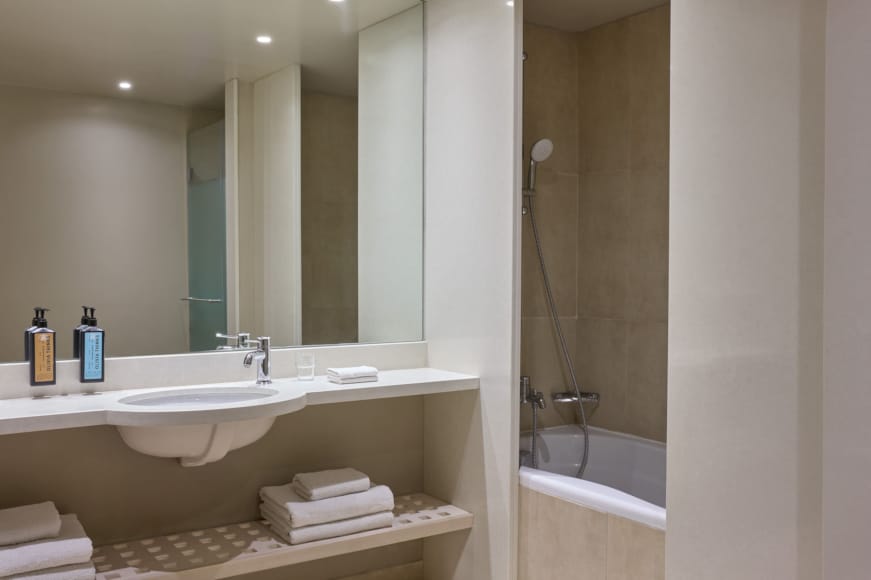 a bathroom with a sink and a bathtub