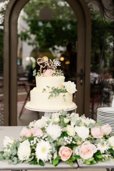 a wedding cake with a crown