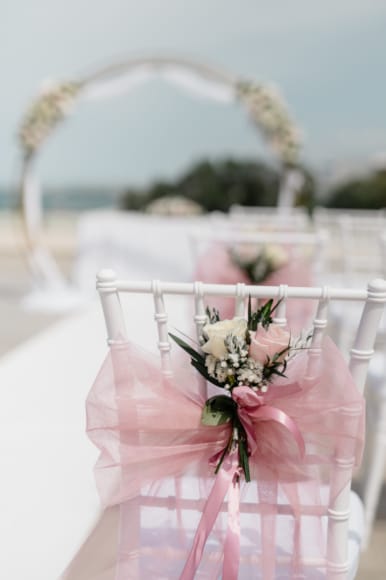 a pink flower in a glass vase