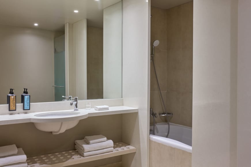 a bathroom with a sink and a bathtub