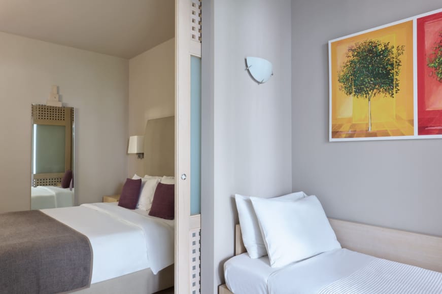 a room with a bed and a couch