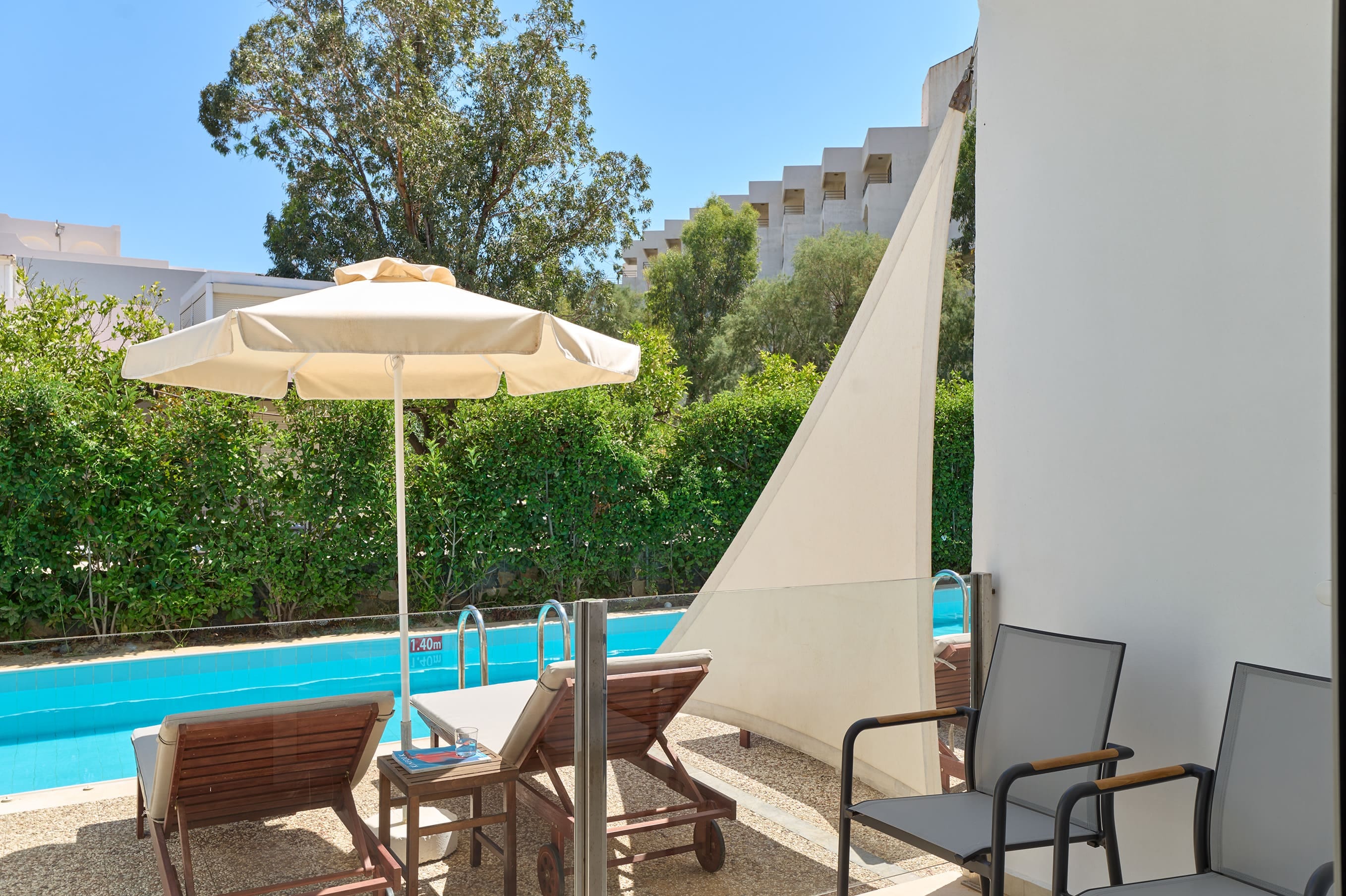 a deck with chairs and umbrellas