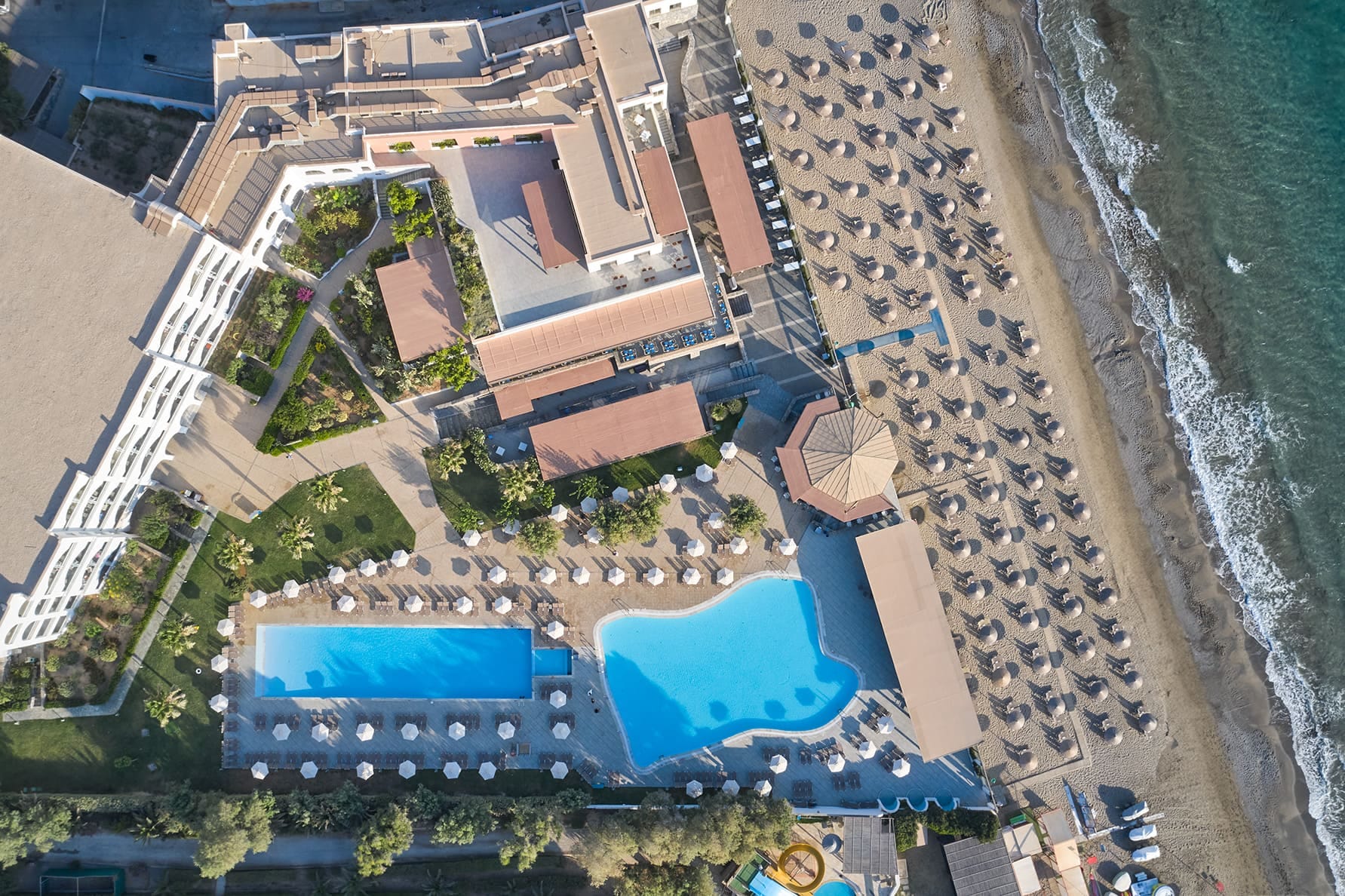 a building with a pool in front