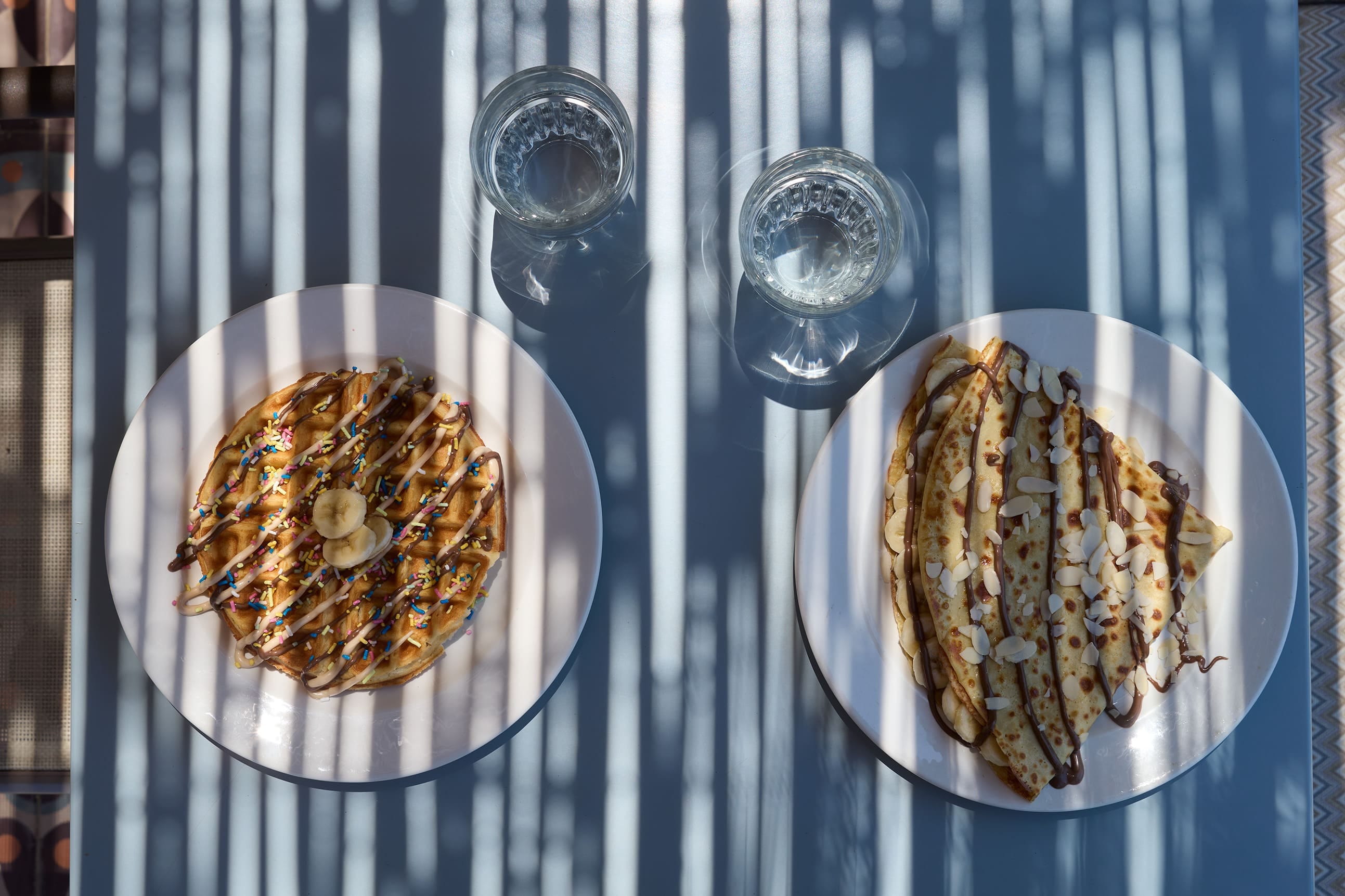 a couple of pies on a glass shelf