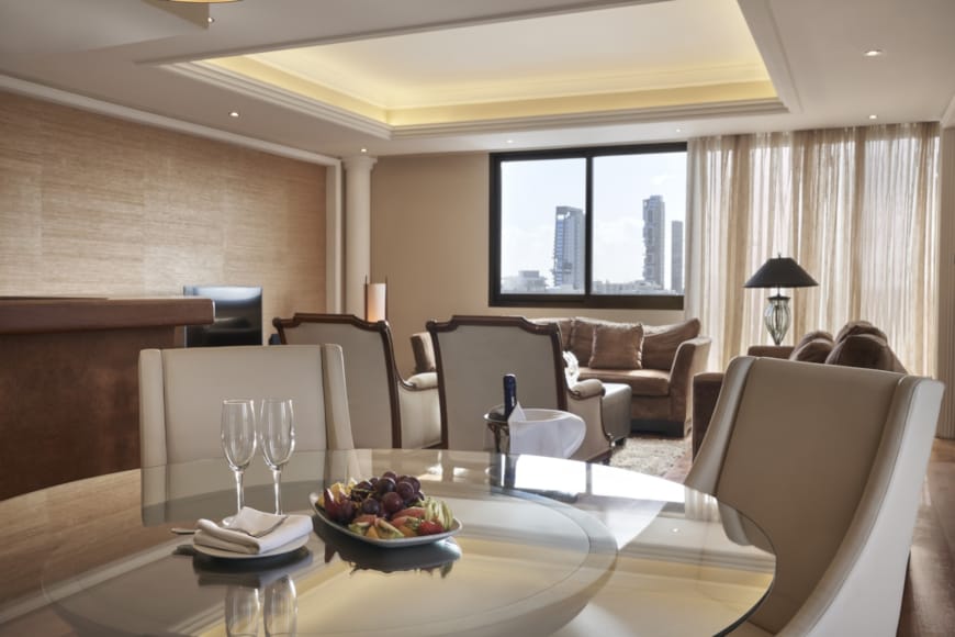 a dining room with a table and chairs