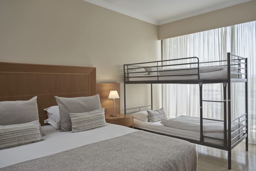 a bed with a metal frame