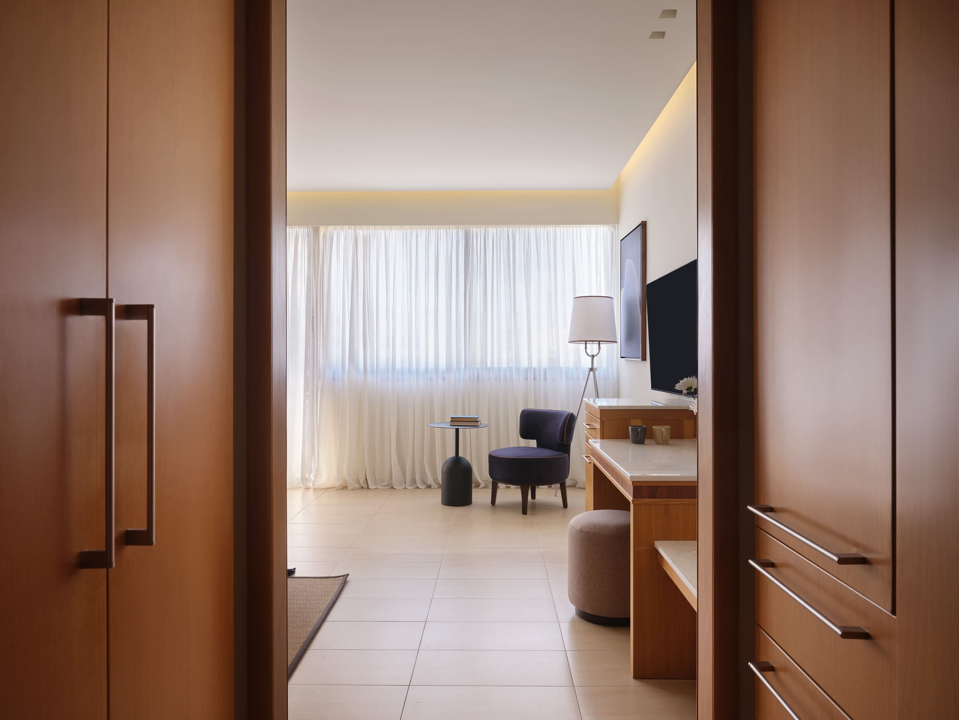 a room with a desk and a chair