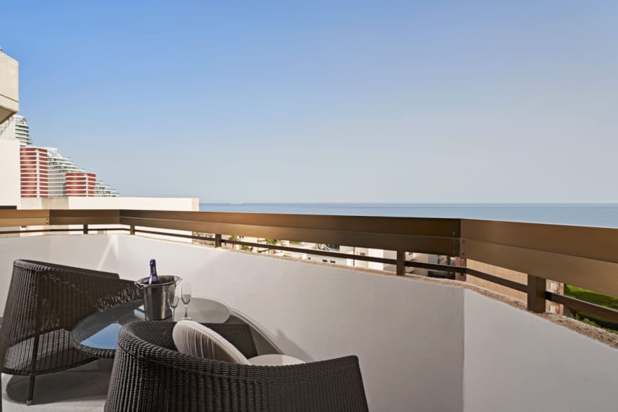 a balcony overlooking the ocean