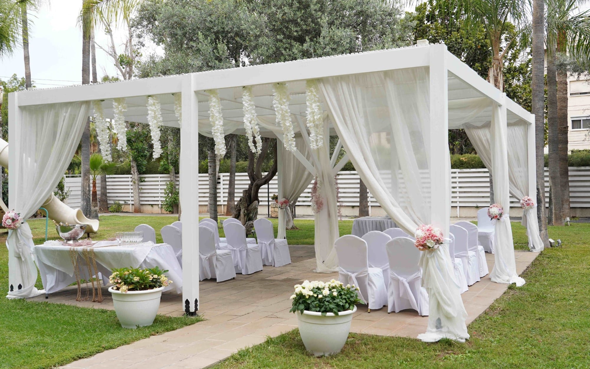 Garden Wedding Ceremony Setup At Atlantica Oasis Limassol