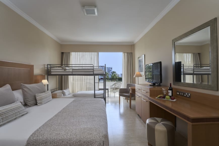 a hotel room with a large window