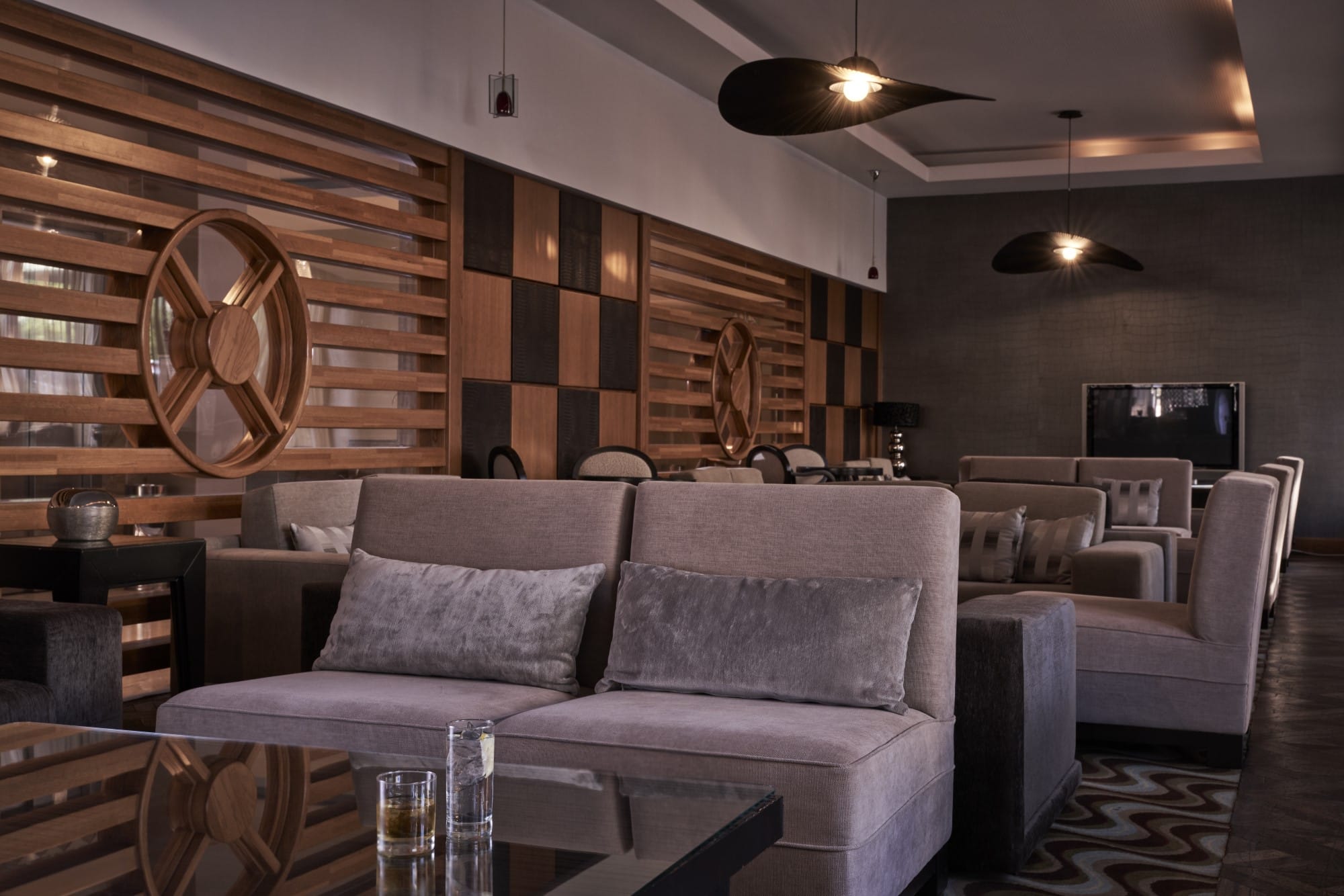 Modern Lounge Bar At Atlantica Oasis Hotel Limassol With Warm Wooden Decor