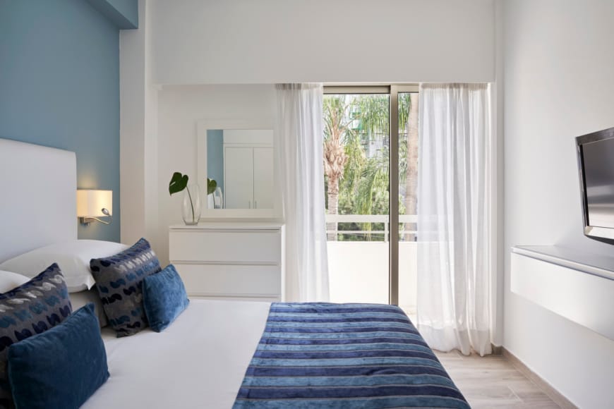 Cozy Double Room With Natural Light At The Atlantica Oasis Hotel In Limassol, Cyprus.