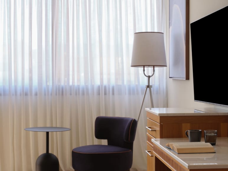 a room with a desk and a chair