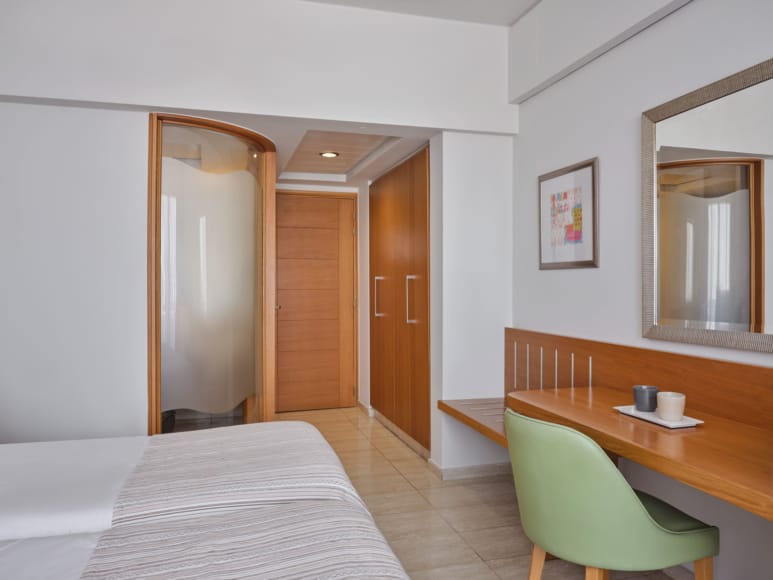 a room with a bed and a table