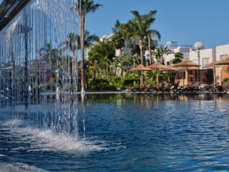 Infinity Pool Edge At The Atlantica Oasis Hotel In Limassol, Cyprus.