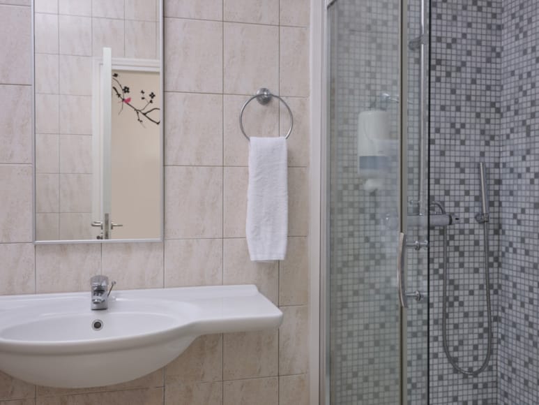 a bathroom with a glass shower