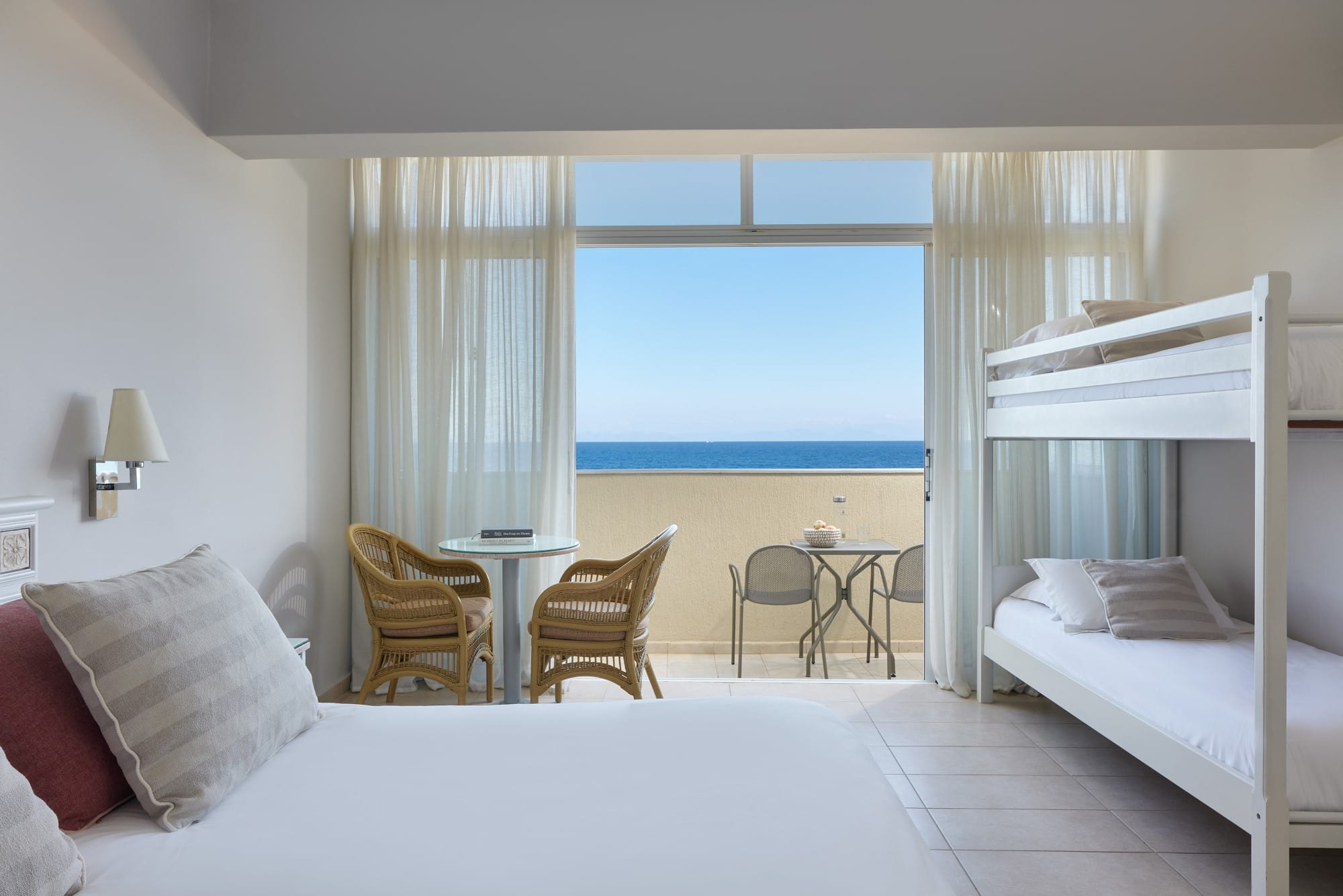 a bedroom with a bed and a table