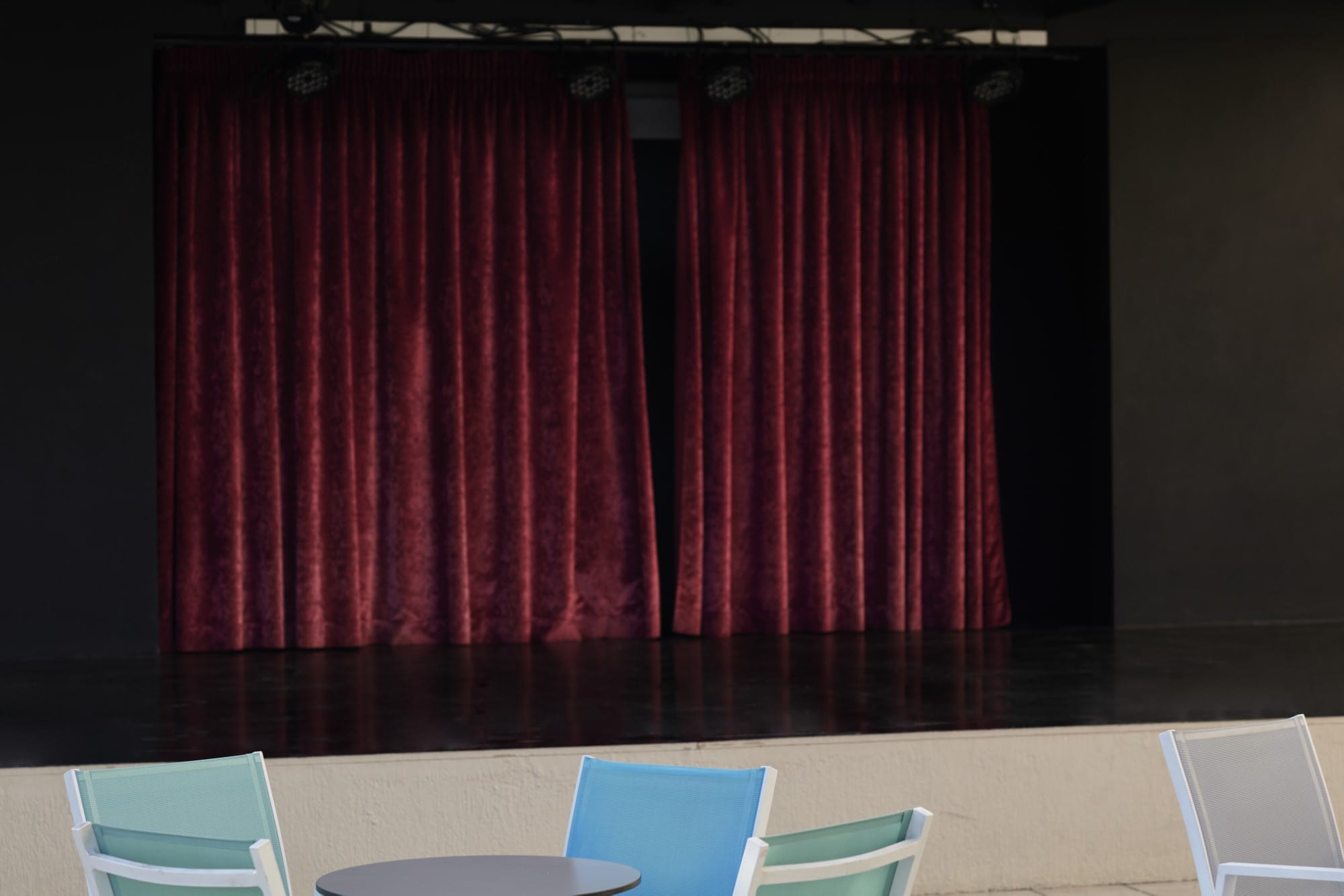 a room with a red curtain