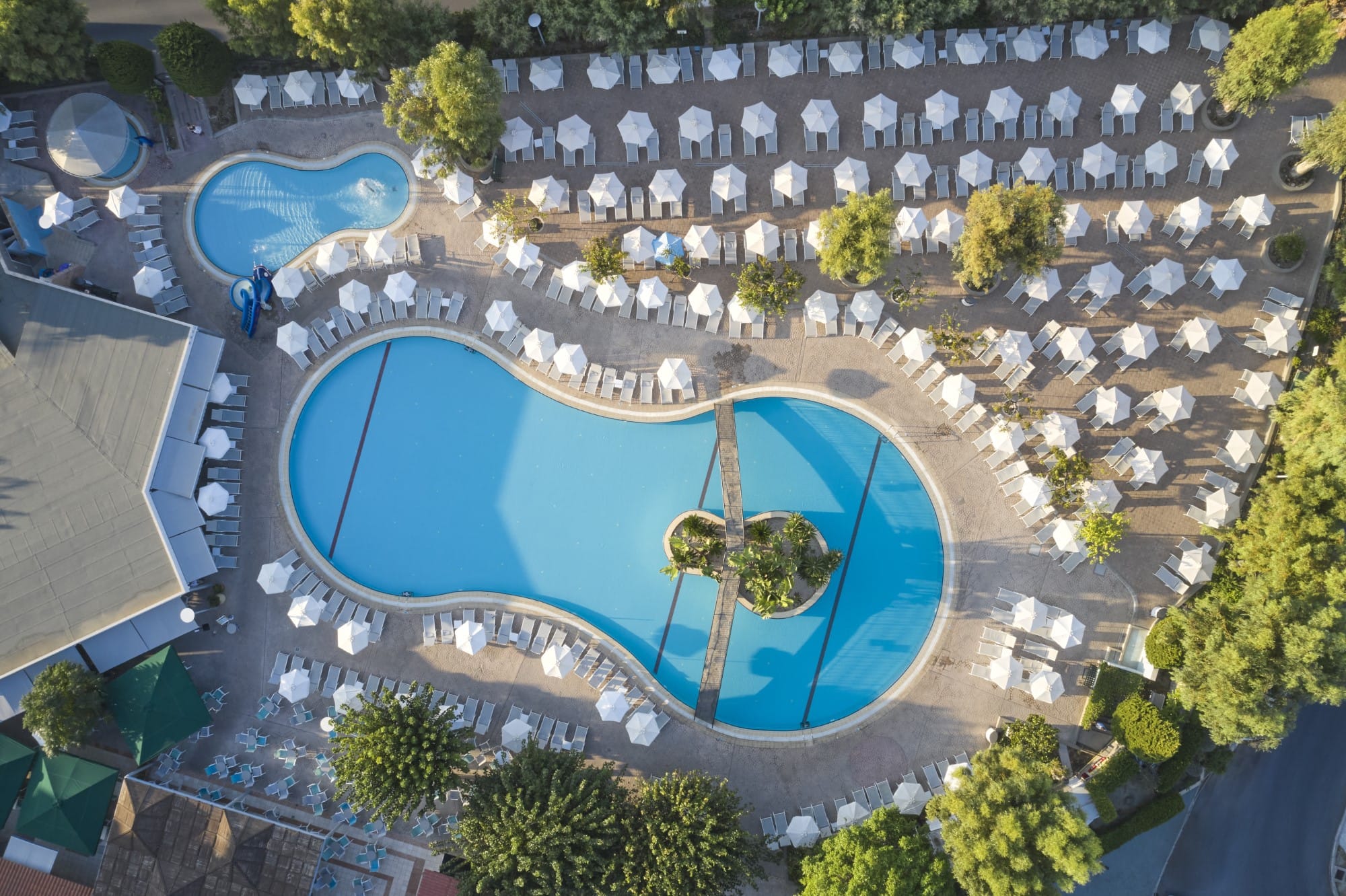 a pool surrounded by trees