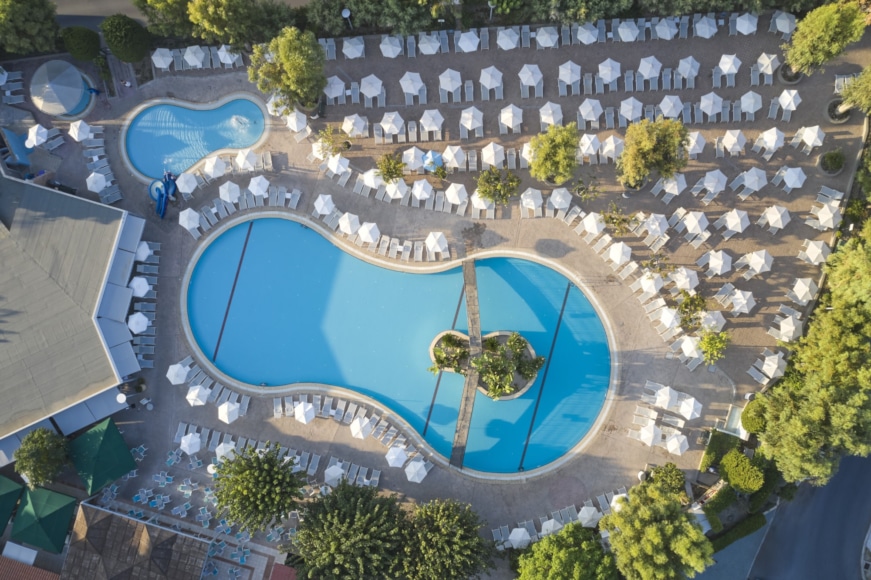 a pool surrounded by trees