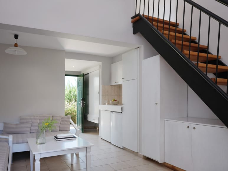 a kitchen with white cabinets