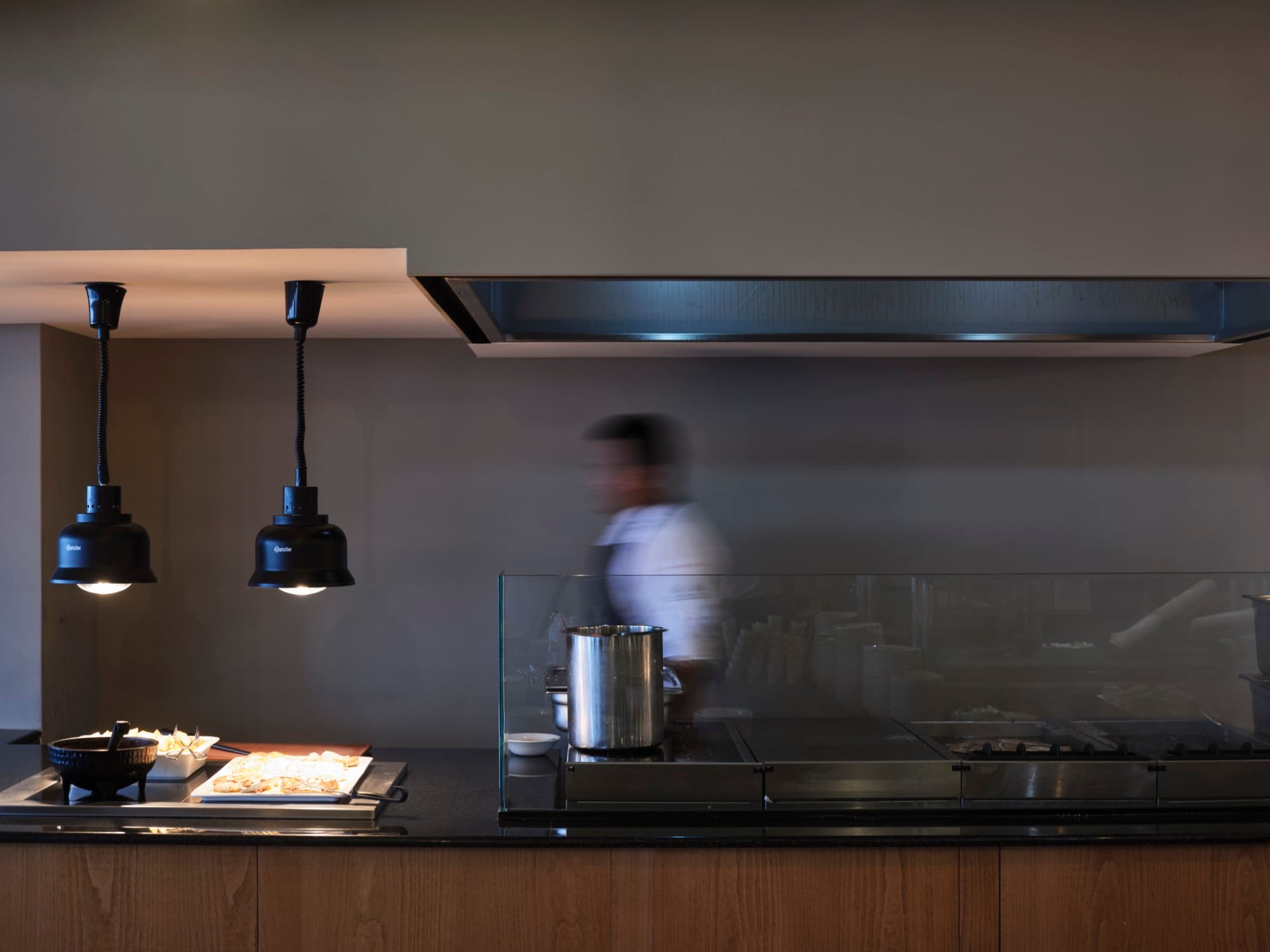 a chef cooking in a kitchen